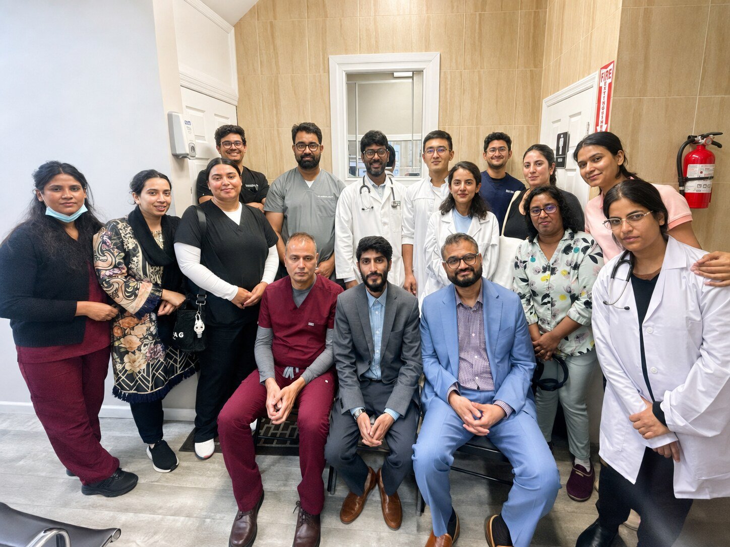 Medical externs and healthcare professionals gathered at the clinic
